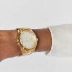 Reloj analógico con brazalete de acero IPG dorado y cristales T-Logo - Imagen 5